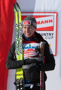 Poland's Justyna Kowalczyk on the podium in Trondheim, Norway.