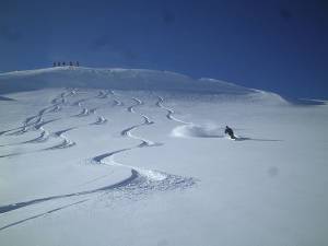 With more terrain available than at all of Colorado's lift served resorts combined, San Juan Ski Co. guarantees powder skiing on its snowcat trips. (photo: San Juan Ski Co.)