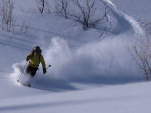 First Tracks!! Online Media editor Marc Guido, of Salt Lake City, enjoys several feet of new powder on Sunday at Snowbasin Resort near Ogden, Utah. (photo: FTO/Amy Zaref)