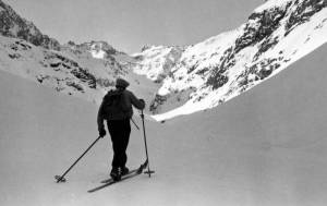 Hannes Schneider ski climbing in his native Arlberg region. Note the way his heel lifts off the ski to allow him to stride forward. (photo: Lothar Rübelt, courtesy of the Schneider Family)