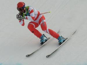 Swiss skier Didier Defago races to a gold medal in the men's downhill at the 2010 Olympic Winter Games in Whistler, British Columbia, Canada. (photo: Kevin Pedraja)