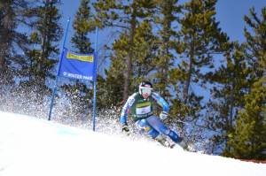 Robby Kelley, of Starksboro, Vt., powers through slushy snow to win giant slalom gold in Winter Park on Sunday. (photo: CJ Feehan)