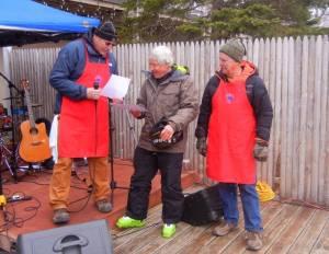 Tom Hanson (center) is given the Sugarloaf Ironman Award by Sugarloaf VP of Operations Rich Wilkinson (left) and Sugarloaf General Manager John Diller at Sugarloaf's annual Season Passholder BBQ on Sunday. (photo: Sugarloaf)