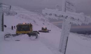 Mt. Hood Meadows staffers work on Monday to reopen the Oregon ski resort's Cascade Express lift following a week of pummeling snow and ice. (photo: Mt. Hood Meadows)