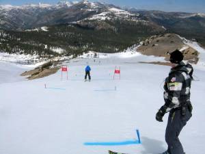 U.S. Ski Team Women's Speed Head Coach Chip White watches from the top of the ski test track in Mammoth. (photo: USSA)