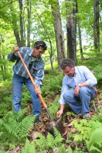 Luc Boulanger and Jean-Michel Ryan plant one of 1,576 trees added to the slopes of Quebec's Mont Sutton ski area this week. (photo: Mont Sutton)