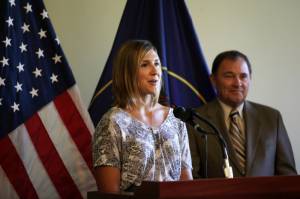 Halfpipe skier Jen Hudak speaks to the media at the Utah State Capitol on Friday as Governor Gary R. Herbert looks on. (photo: USSA/Sarah Brunson)