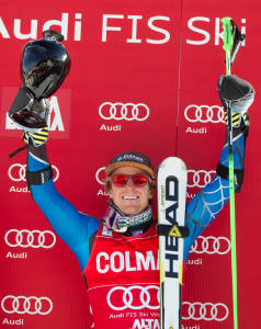 Utah's Ted Ligety hoists the trophy for winning the Audi FIS Alpine Ski World Cup Giant Slalom race on Sunday in Alta Badia, Italy. (photo: Mitchell Gunn/ESPA)