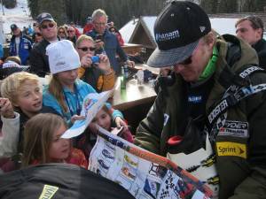 Ted Ligety signs autographs for young fans at Sunday's Birds of Prey World Cup giant slalom at Beaver Creek ski resort in Colorado. (photo: Doug Haney)