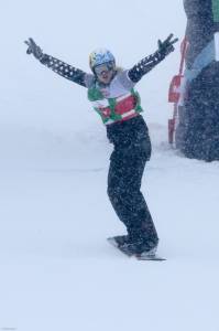 Canada's Dominique Maltais celebrates victory in Saturday's women's World Cup snowboard cross race in Montafon, Austria. (photo: FIS/Oliver Kraus)