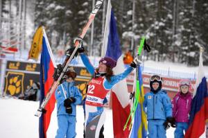 Stacey Cook, of Mammoth Lakes, Calif., celebrates her second World Cup podium finish in as many days, in Lake Louise, Canada on Saturday. (photo: Roger Witney)