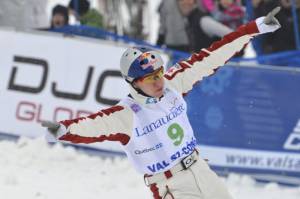 Travis Gerrits of Canada celebrates his run in the final round of the Freestyle FIS World Cup Event on Saturday in Val-Saint-Come, Quebec. (photo: Phillip MacCallum)