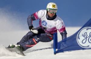 Austrian snowboarder Andreas Prommegger competes on Thursday in the parallel giant slalom at the 2014 Olympic venue in Sochi (photo:: GEPA pictures/ Daniel Goetzhaber)