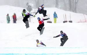 Men's World Cup snowboard cross action at the 2014 Olympic venue in Sochi, Russia on Sunday: Alessandro Haemmerle (AUT), Alex Pullin (AUS), Pierre Vaultier (FRA), Markus Schairer (AUT) and Alex Deibold (USA). (photo: GEPA pictures/ Daniel Goetzhaber)