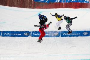 Saturday's Men's final at the SBX World Cup at Blue Mountain Resortin Collingwood, Ontario, Canada. Riders: Christopher Robanske (CAN) in red ahead of Alex Pullin (AUS) in blue, Nick Baumgartner (USA) in green and Markus Schairer (AUT) in yellow. (photo: Marc Landry)