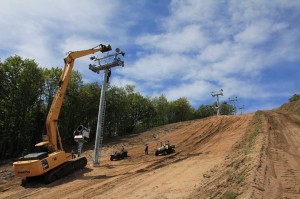 Workers install crossbars and sheaves on Crystal Mountain's new Buck Quad chairlift earlier this month. (photo: Crystal Mountain)