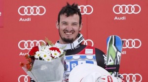 Italy's Dominik Paris stands atop the World Cup podium following Saturday's downhill in Lake Louise, Canada. (photo: FIS/Agence Zoom)