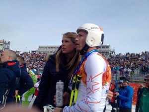 Bode Miller and wife Morgan Beck watch with disappointment from the finish line at the Men's Olympic Downhill in Rosa Khutor, Russia, last February. (photo: Doug Haney/USST)