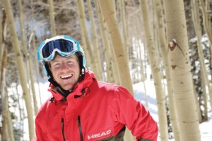 U.S. Ski Team member and Park City, Utah native Ted Ligety smiles in the trees at Park City Mountain Resort. (photo: Park City Mountain Resort/Dan Campbell)