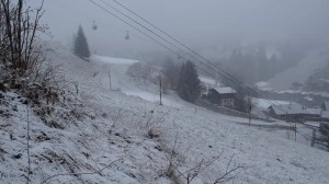 Snow is falling today in La Clusaz, but it's not enough to rescue the Christmas holiday for the French ski resort.  (image: screenshot from Office de Tourisme SEML La Clusaz video)