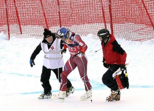 Norway's Aksel Lund Svindal is assisted by medical staff after crashing during the men's downhill race of the Audi FIS Ski World Cup in Kitzbuehel, Austria, on Saturday. (photo: Getty/AFP-Robert Jaeger via USST)