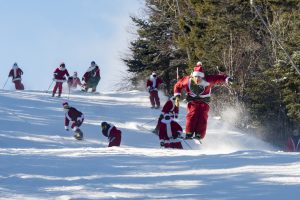 The 2016 Santa Sunday at Sunday River Resort took place on Barker Mountain at the Maine ski area. One hundred and eighty Santas raised $2,845 for the Sunday River Charitable Fund. (photo: Sunday River Resort)