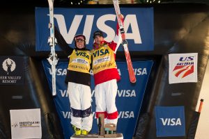 Australia's Britteny Cox, and Mikael Kingsbury of Canada celebrate dual moguls victories at Deer Valley Resort in Utah on Saturday night. (photo: Steven Earl)