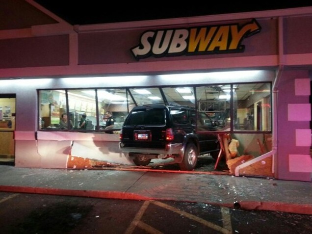 suv crashes subway.jpg