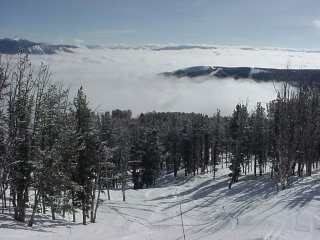 Morning fog hangs in the Gallatin River Valley (photo Marc Guido)