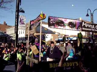 Revelers celebrate at the Magic Hat Mardi Gras Parade and Block Party in Burlington