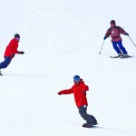 Skiers and boarders enjoy their first turns of the season today at Loveland Ski Area in Georgetown, Colo. (photo: Jack Dempsey/CSCUSA)