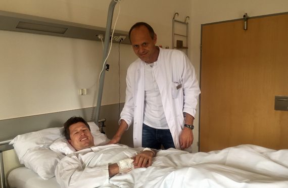 Dr Michael Gabl checks in on super G world champion at a hospital in Innsbruck, Austria. (photo: Aichner / ÖSV)