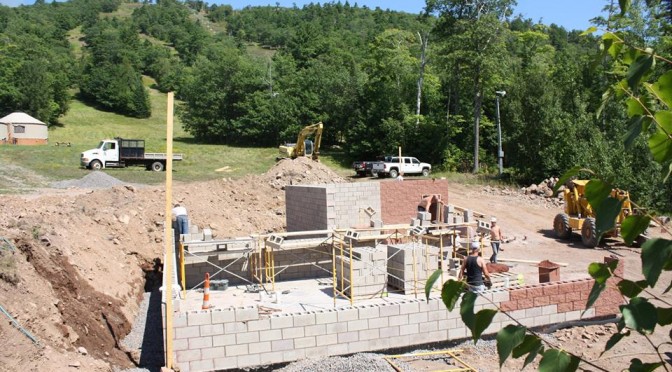 Construction continues on Mount Bohemia's new log cabin bar/hostel. The uptairs will feature a log cabin bar with outdoor hot tub, and the lower level will house a 24-bed hostel. (photo: Mount Bohemia)